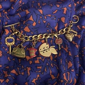 Juicy couture gold tone charm bracelet